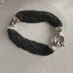 Authentic Tiffany & Co. Vintage Multistarnd Link 925 Silver Braided Strand Bracelet RARE  Length: approx 7.5” Width: 0.5" Metal Type: Sterling Silver 