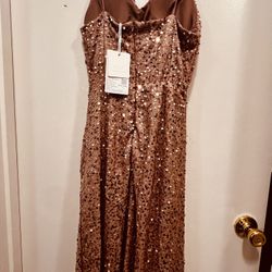 Host and singer's brand new gold sequined, front-slit, sexy, stretchy evening gown.  Comes with tag.  Fits sizes XS-S.
