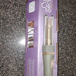 Curl Secret Hair Curling Iron. 