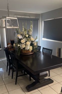 Table and 8 chairs (with cushions)
