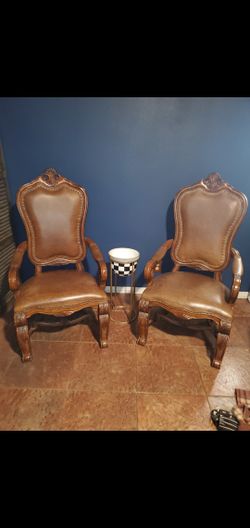 2 big Brown Leather Chairs And Table