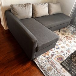 L Shaped IKEA Couch With Storage And Pull Out Bed