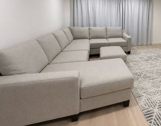 Light Gray Sectional Sofa with Ottoman