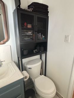 Over toilet storage cabinet shelving