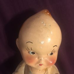 Super old antique kewpie doll about 8 inches ceramic