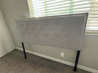 Gray Tufted Fabric Headboard with Nailhead Trim