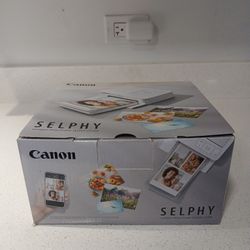 The Black Canon SELPHY CP1500 Wireless Compact Photo Printer is a portable mobile printer that uses dye sublimation technology to produce high-quality