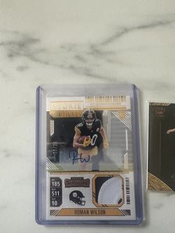 Roman Wilson auto and number patch out of 25 and Josh scobee