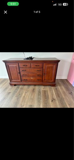 Cherry Wood Dresser with Drawers and Cabinet Doors and Beautiful Table with its 6 chairs and a Wood and Glass Display Cabinet Hutch