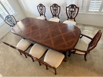 Like new large solid wood dining table & 8 chairs! CAN DELIVER!!