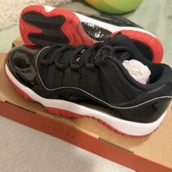Jordan 11 Low Bred