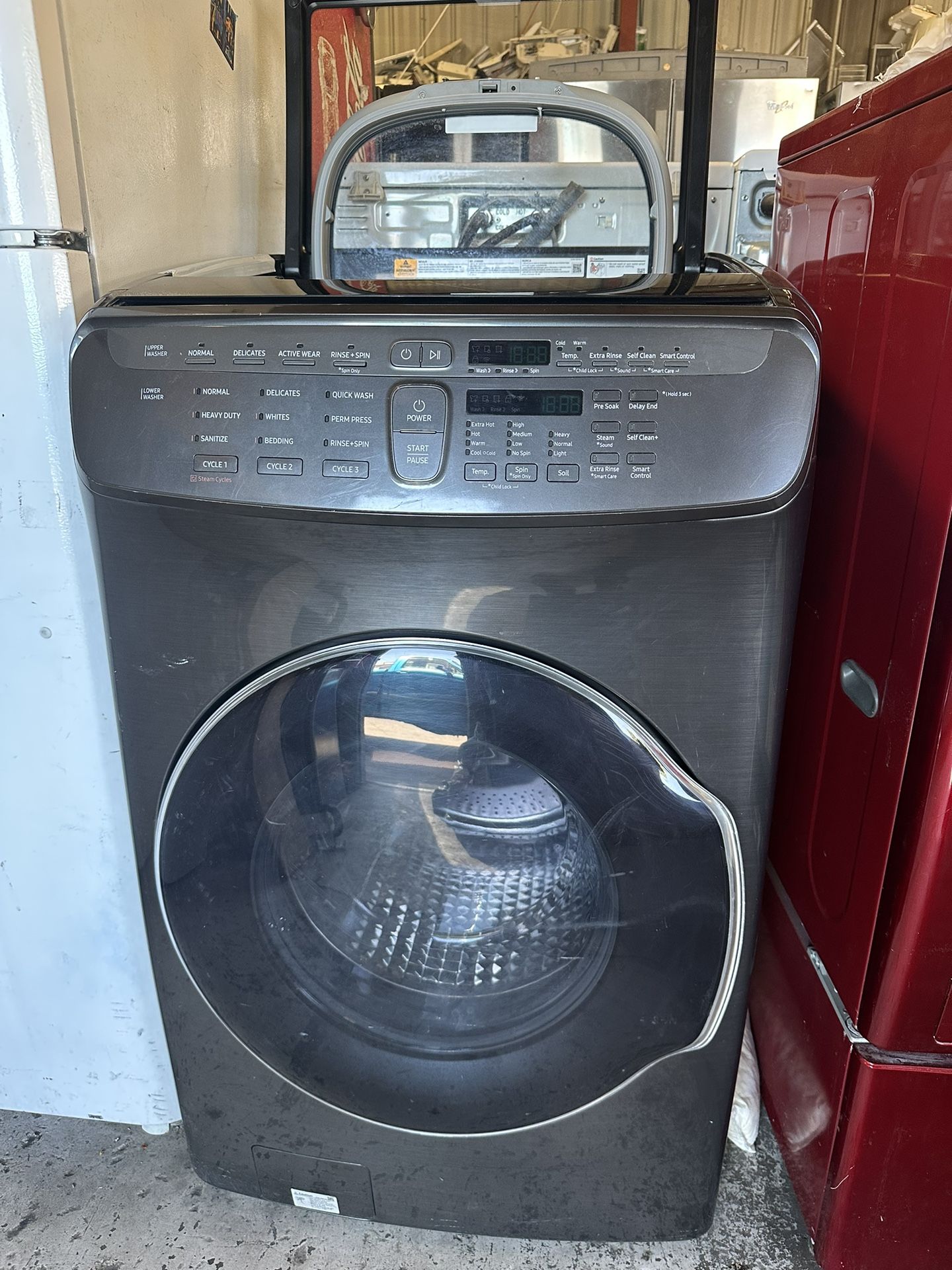 Samsung 5.5 Cu.Ft. Double washer FrontLoad Steam & FlexWash - Black Stainless Steel Can deliver Retails at $1529