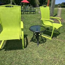 Two Green Outdoor Chairs With Table 