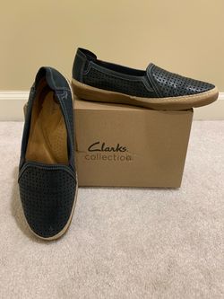 Ladies Clark’s navy slip on shoes