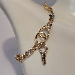 Gold Tone Rhinestone Key And Handcuff Bracelet