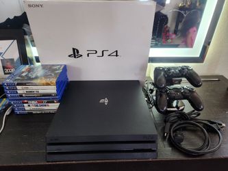 Ps4 pro 1tb with games and 2 controller