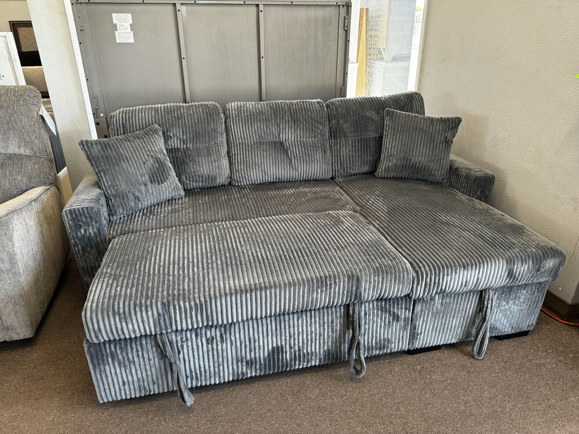 Reversible Sectional With Pullout Bed And Storage
