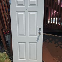 Front door for a trailer.
Thirty three by seventy four and a half