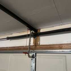 GARAGE DOOR SPRING REPLACEMENT 