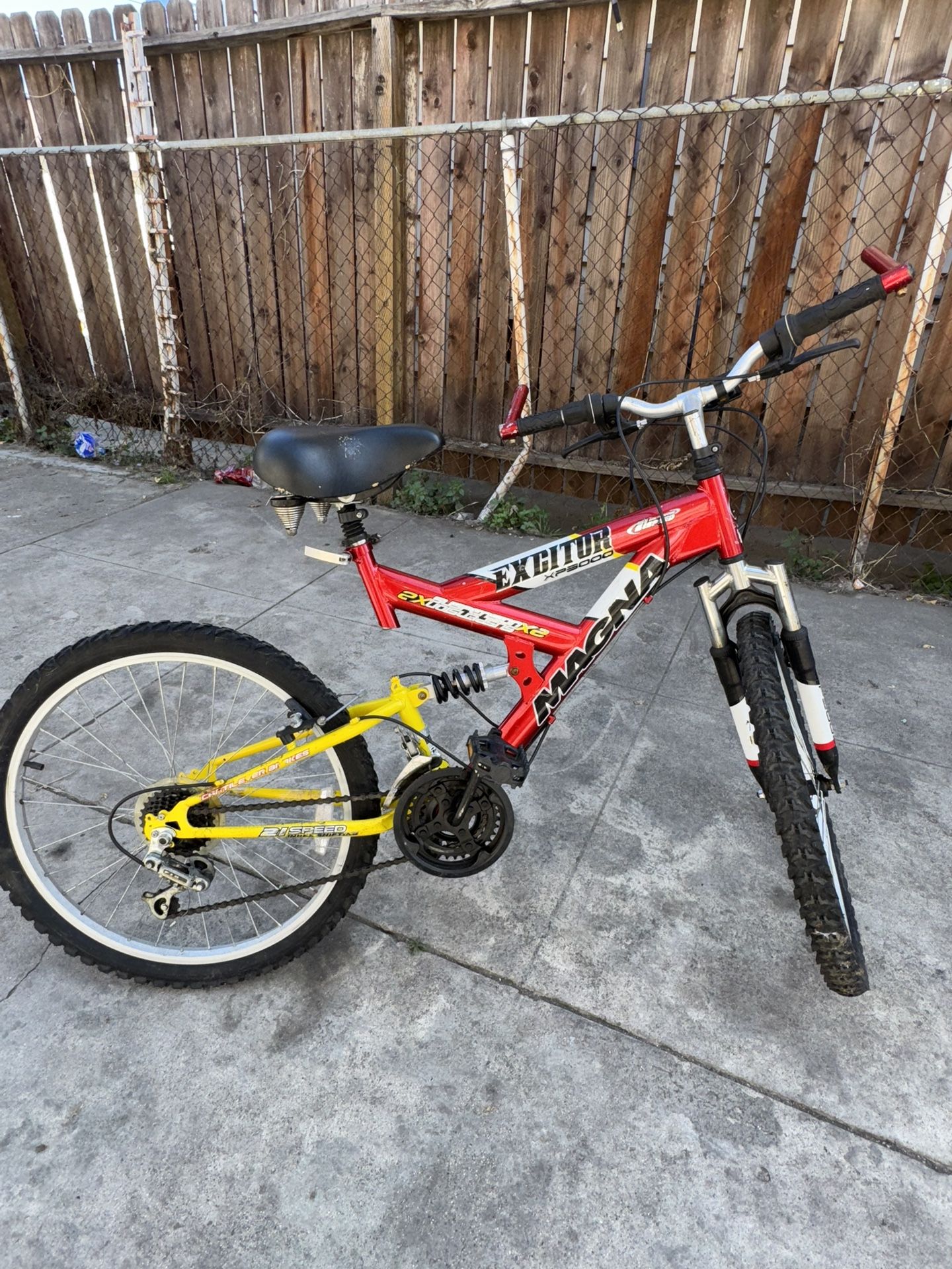 Red And Yellow Magna Excitor XP3000 Mountain Bike