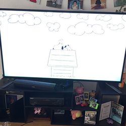 TV WITH APPLE TV AND SOUNDBAR