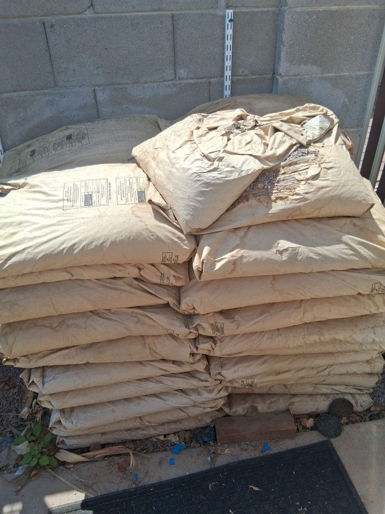 40 Bags Of Stone, Pebble , Aggregate 50 lb Bags For $15.00 A Piece