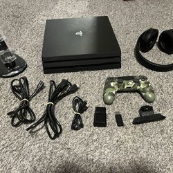 PS4 Pro with accessories 