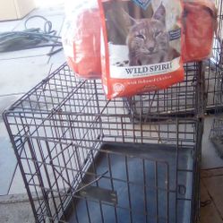 Dog Kennel And  Blue Buffalo Cat Food 