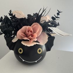 a new ceramic vase with Halloween decor