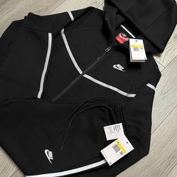 Black Nike tech reflective