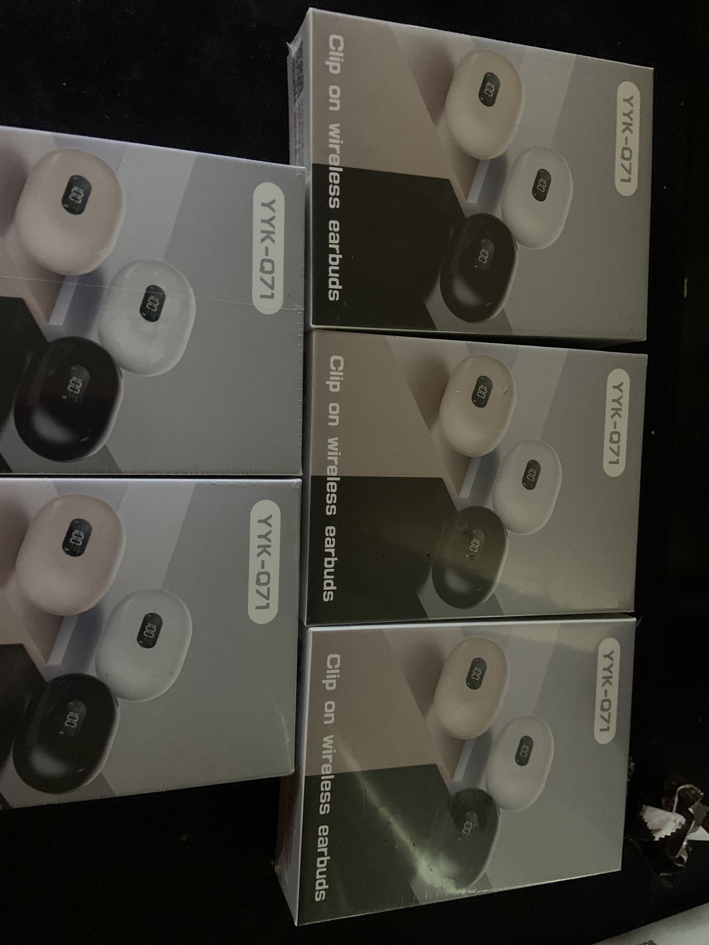 Clip on wireless earbuds