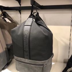 Brand new with tag Calvin Klein men black/gray man made durable faux leather backpack  Size 11x7x18 inches