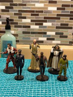 Star Wars Lucas Films and Disney action figures and or cake toppers.
