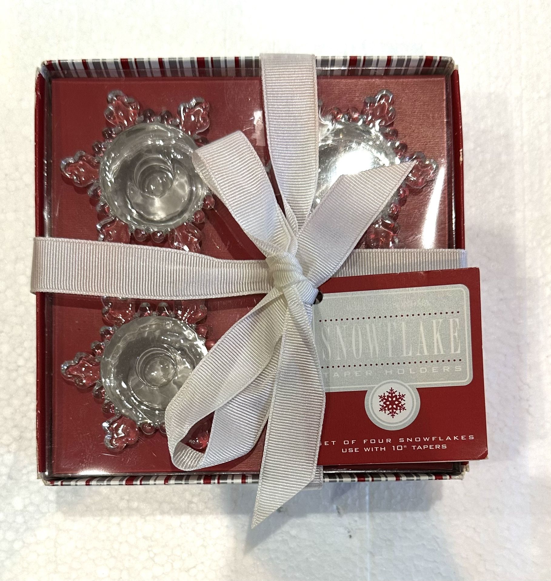 Williams Sonoma “ snowflake” candle holders.