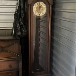 Antique grandfather clock with matching desk