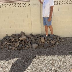 Free river rock! Rock pile is 7 feet long by 2 feet in depth and about a foot high. Back your vehicle and through the RV gate and put them right in th
