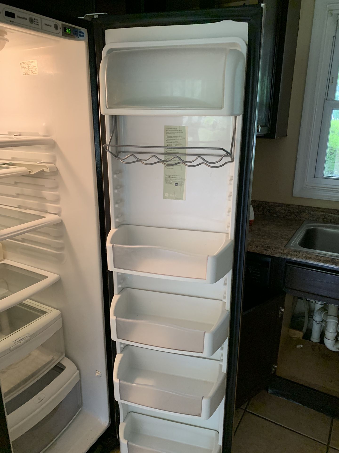 GE Refrigerator No water comes out of the device. If it makes ice