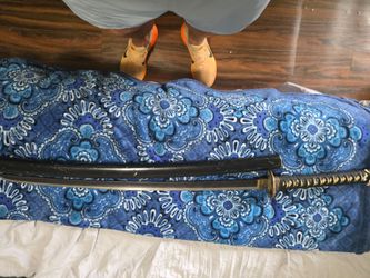 vintage Japanese samurai s w o r d. Steel forged  runs through the handle. Not some flimsy wall decorative albeit it can be. Steel from bottom of hand