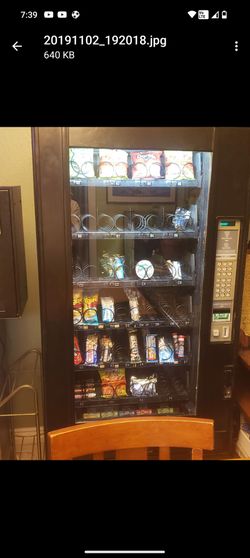 2 vending machines with change maker