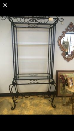Metal stand with three glass shelves
