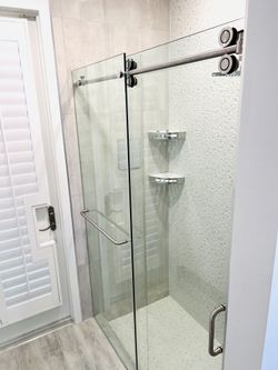 FRAMELESS  GLASS SHOWER ENCLOSURE