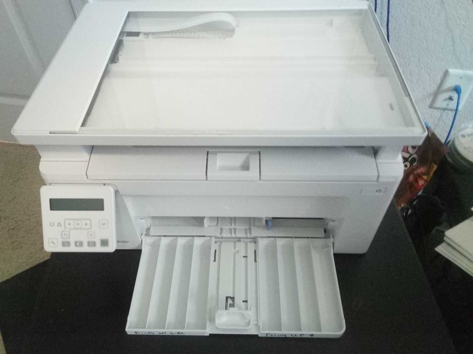 Hp laser printer and scanner, does wireless and wired lan and usb