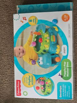 Fisher price polity pop musical dino