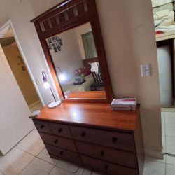 Dresser And Mirror With Full Size Bed.