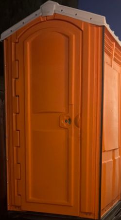 Orange new porta potty
