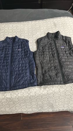 (2) Men’s Patagonia Nano puff vest’s. (Large) (Bundle Deal)