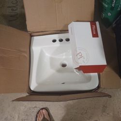 Wall Mount Lavatory And Faucet 