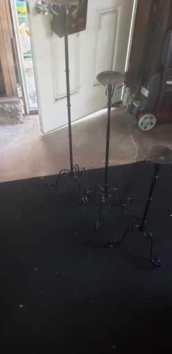 3 black candle holders