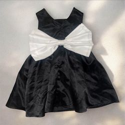 Size2/3T black dress with large white coquette bow on the back