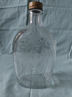 Vintage log cabin syrup bottle